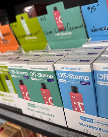 Off-Stamp disposable vapes on the shelf at Shelly's Kleen Tobacco